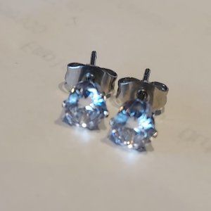 Sparkling Sapphire stud earrings simulated round cut and colour is clear metal